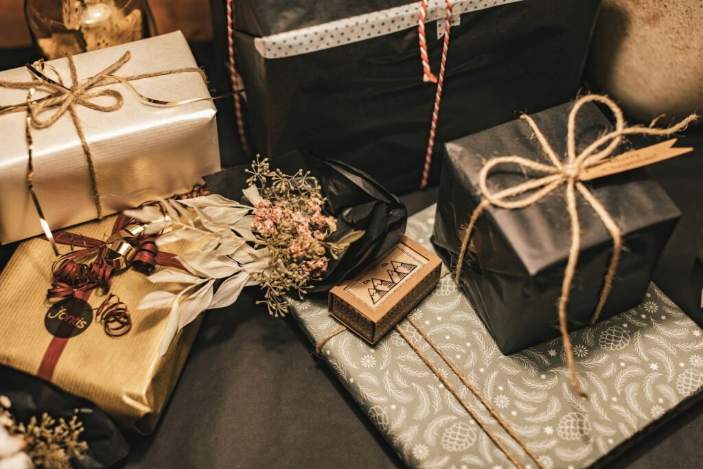 Black and kraft wrapped gifts with twine